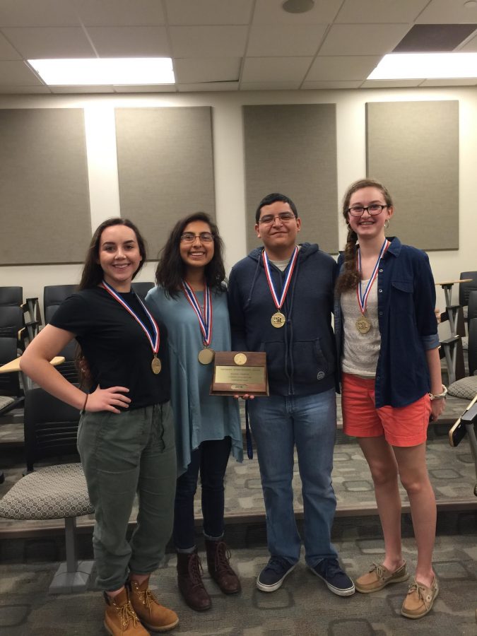 2015-16 Literary Criticism team shows off their medals from regional competition.

