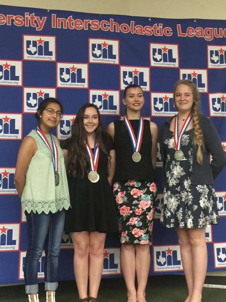 2016-17 Literary Criticism team poses with their medals after their win at State.