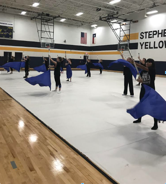 Winterguard practices their routine for Fridays performance.