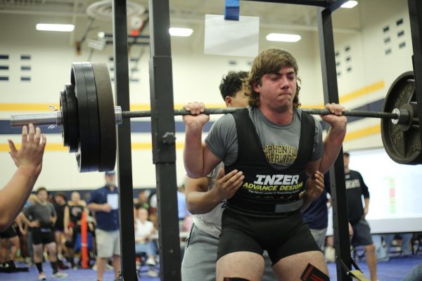 Mason Hodges places 1st in the 220 weight division.